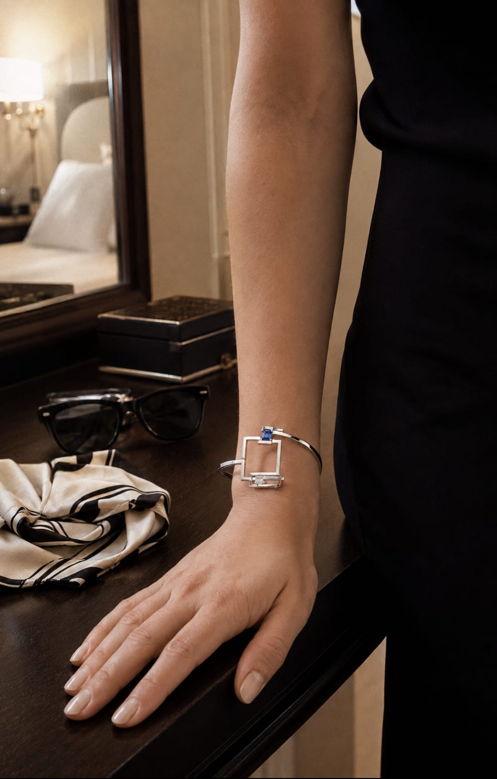 Frame Language collection — geometric gold jewelry with diamonds, emeralds, and sapphires